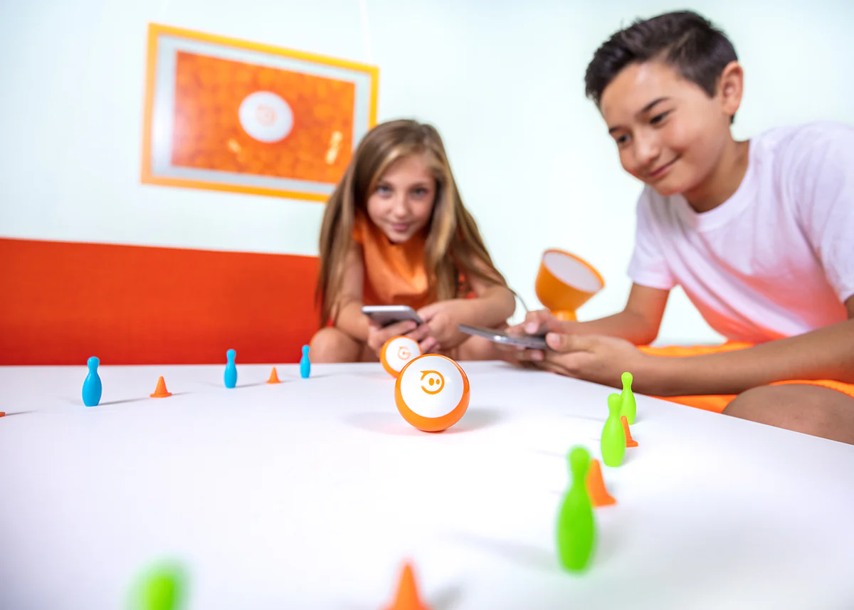 Children playing with Sphero Mini robot